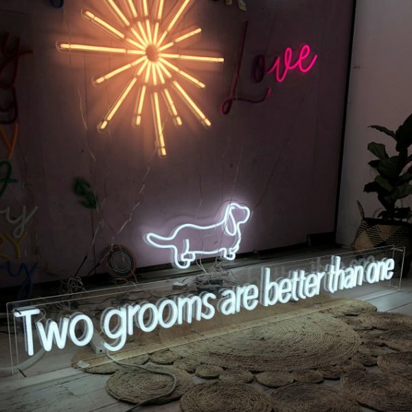 Two Grooms are Better than One LGBTQ+ Friendly Wedding Sign in LED neon flex, shown among other signs from Custom Neon UK