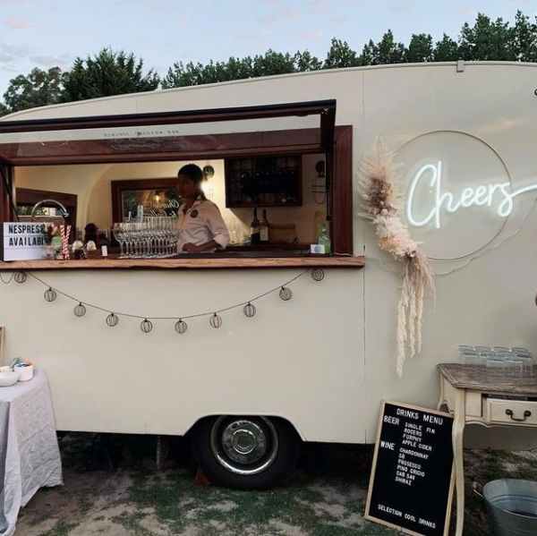 Cheers white light sign by CUSTOM NEON® on the @minteventscollective bar van