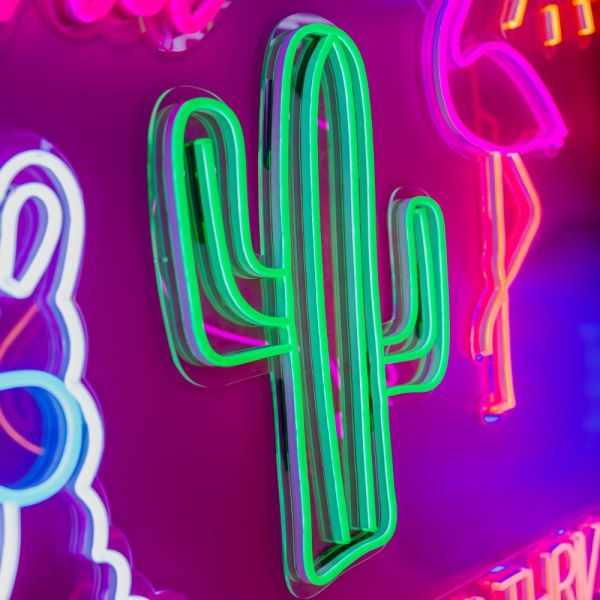 Cactus neon art in green LED flex shown on the Custom Neon wall
