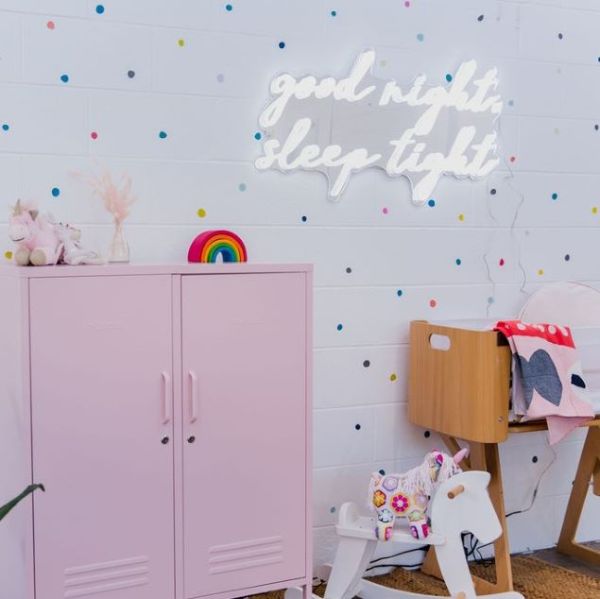 Good Night Sleep Tight white LED nightlight sign on silver mirrored backing wall mounted in a nursery by CUSTOM NEON® 