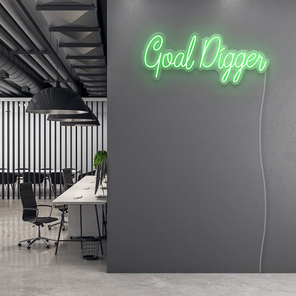 Goal Digger CUSTOM NEON® pre-designed light sign shown in green on slate grey office wall