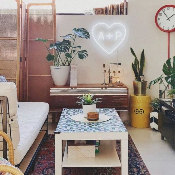 Heart personalized with initials hung in living room - from Custom Neon