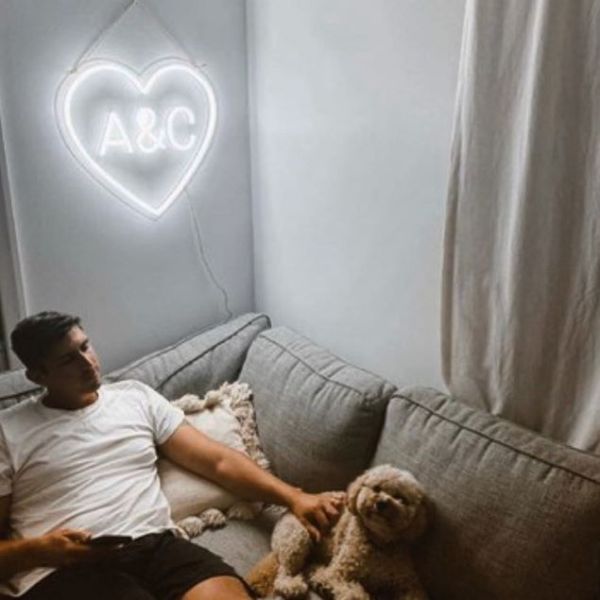 Heart personalized with initials hung in living room - from Custom Neon