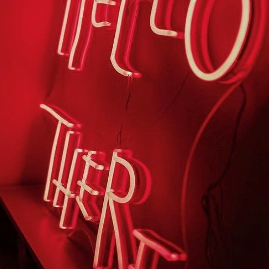 Close up of the Hello There / Hell Here 2in1 neon flex wall art in red made by @customneon for @lunapalmphoto