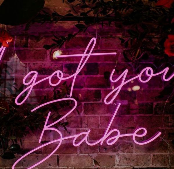 I got you babe neon look light sign shown at a wedding - from Custom Neon®