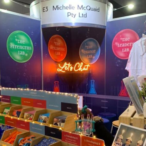 Let's Chat light-up sign shown at a tradeshow - photo from CustomNeon.co.uk
