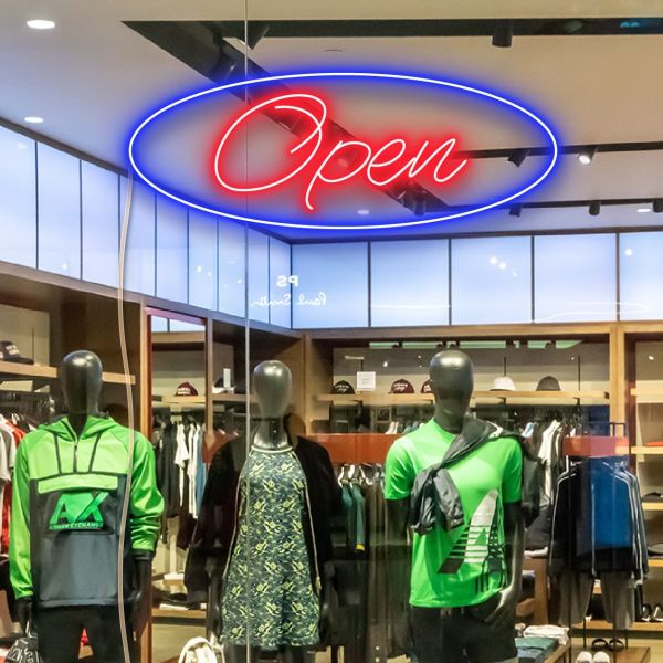 Two colour LED neon open sign using the Alexa font shown close up in clothing store window - from CustomNeon.co.uk