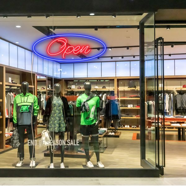 Two colour LED neon open sign using the Alexa font shown in clothing store window - from CustomNeon.co.uk