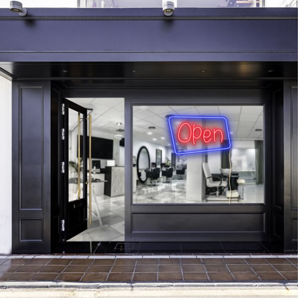 Neon look LED shop open sign shown in a hairdresser's shop window - from CustomNeon.co.uk