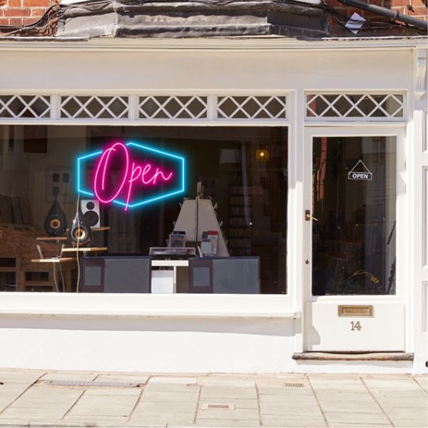 LED neon flex open sign shown in a shop window - from CustomNeon.co.uk