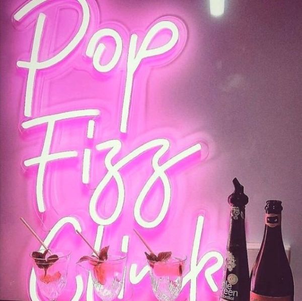Pop Fizz Clink light sign in pink neon flex created for @missfizz by Custom Neon®