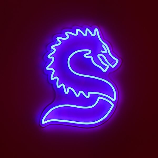 Stylized Chinese Dragon LED neon art from Custom Neon® shown illuminated in blue against a dark background