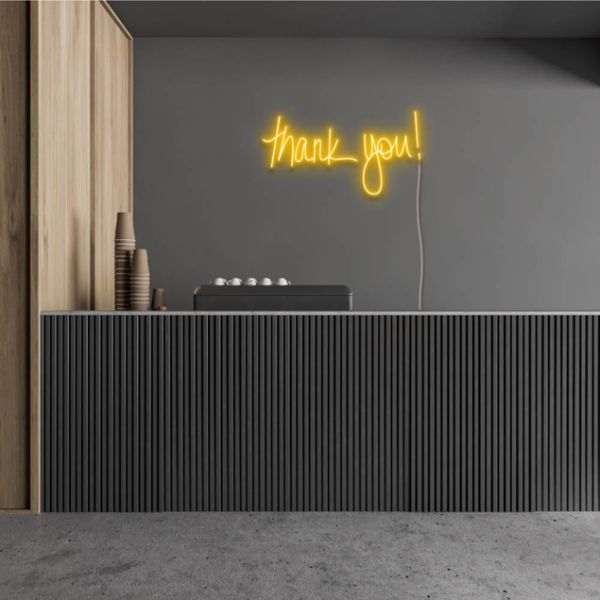 thank You! yellow neon flex sign shown wall mounted in a cafe - from Custom Neon®