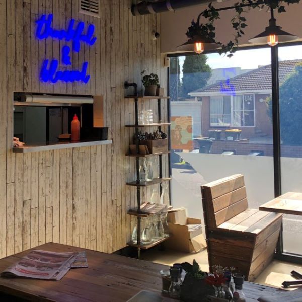 Thankful & Blessed LED neon sign shown @9gramscafe mounted above the serving counter - made by @customneon