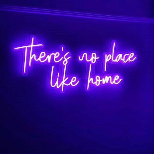 There's No Place Like Home Custom Neon® light sign in purple shown wall mounted - photo @seductivevillian