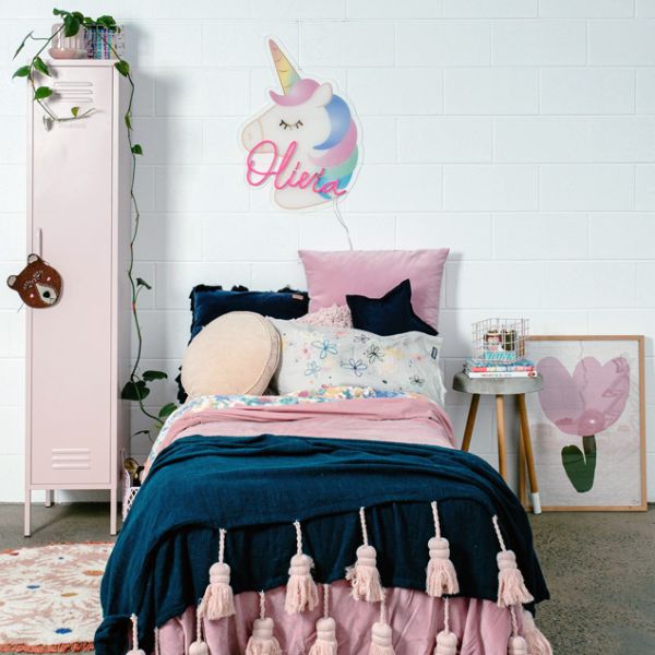 Personalised children's room name sign in neon flex with unicorn background, shown withe the LED turned off - from CustomNeon.co.uk