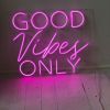 Good Vibes Only neon sign in pink shown  illuminated - from Custom Neon®