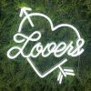 Heart shaped neon flex with Lovers written inside shown on green wall - from Custom Neon®