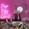 Pop Fizz Clink light sign in a mobile bar - from Custom Neon®
