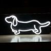 LED neon dog shown in white on a shelf  - photo from CustomNeon.co.uk
