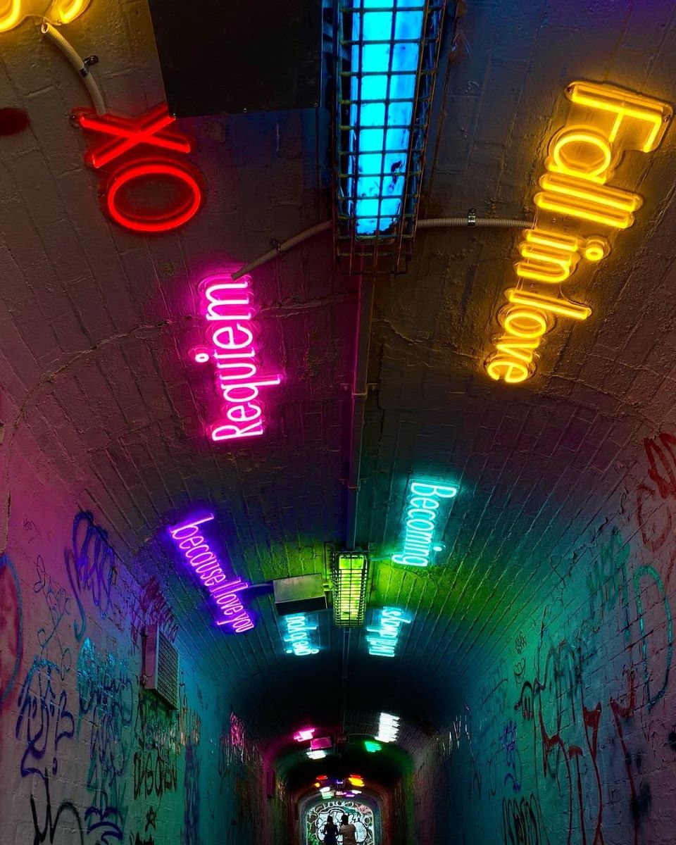 Custom Neon® quote and word signs on tunnel ceiling - concept & design by @k.h.bebe for @sydneyworldpride