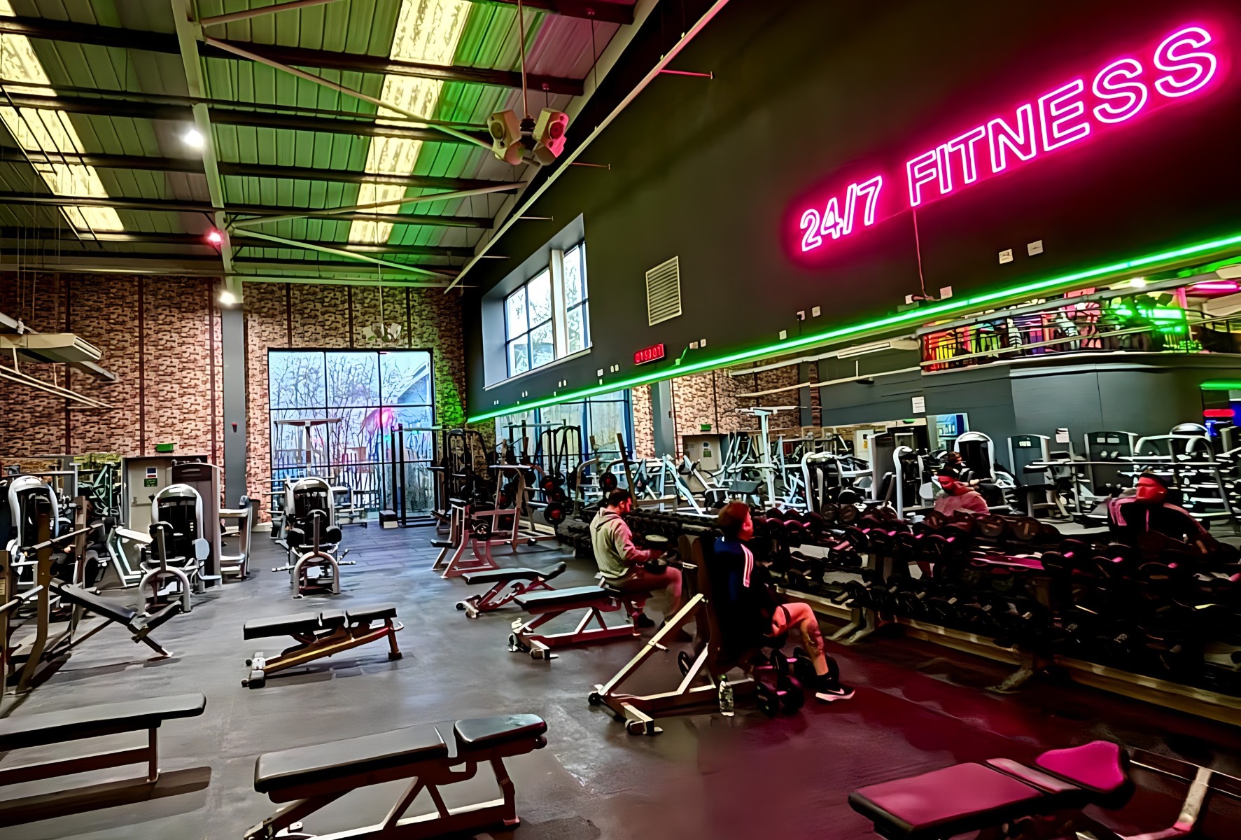 Large pink LED neon fitness centre name sign @247fitnessyork made by Custom Neon®