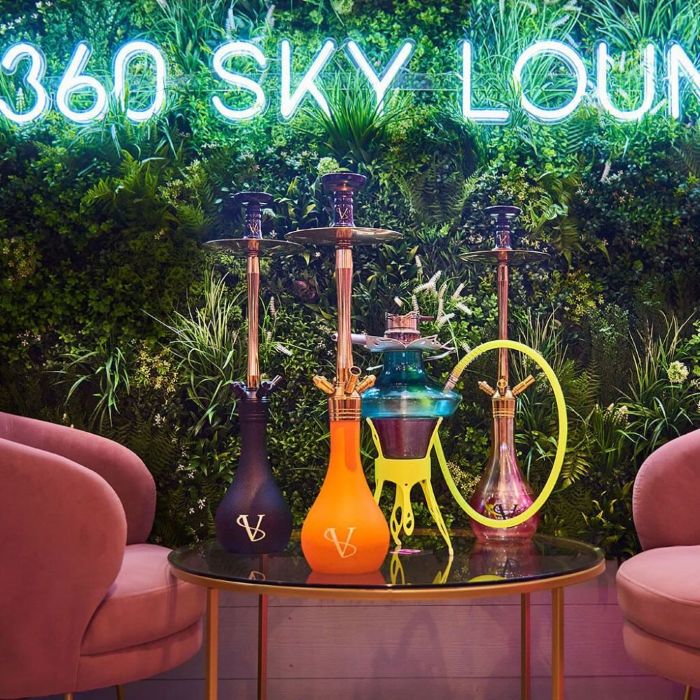 360 Sky Lounge white LED Custom Neon® restaurant name sign on greenwall @360skyloungenewcastle