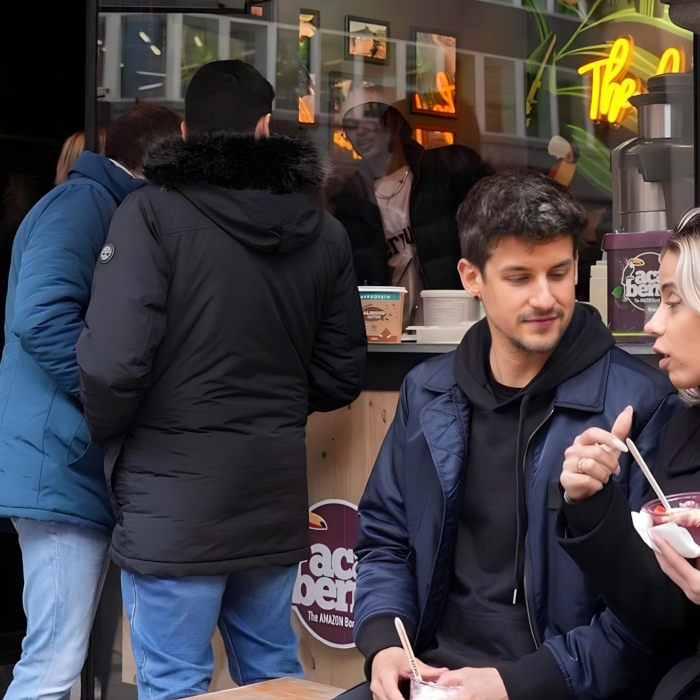 Custom Neon® yellow LED neon tagline sign @acaiberryfoods at The Royal Exchange photo by @brucegillinghampollard