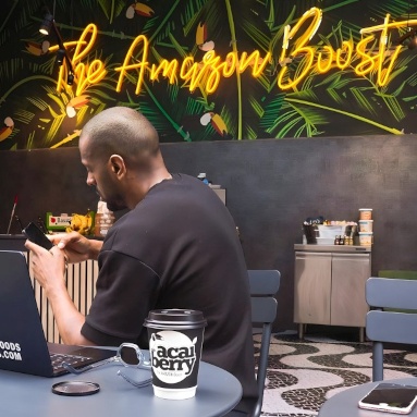The Amazon Boost yellow Custom Neon® sign on tropical wallpaper at the St James' @acaiberryfoods superfood bar