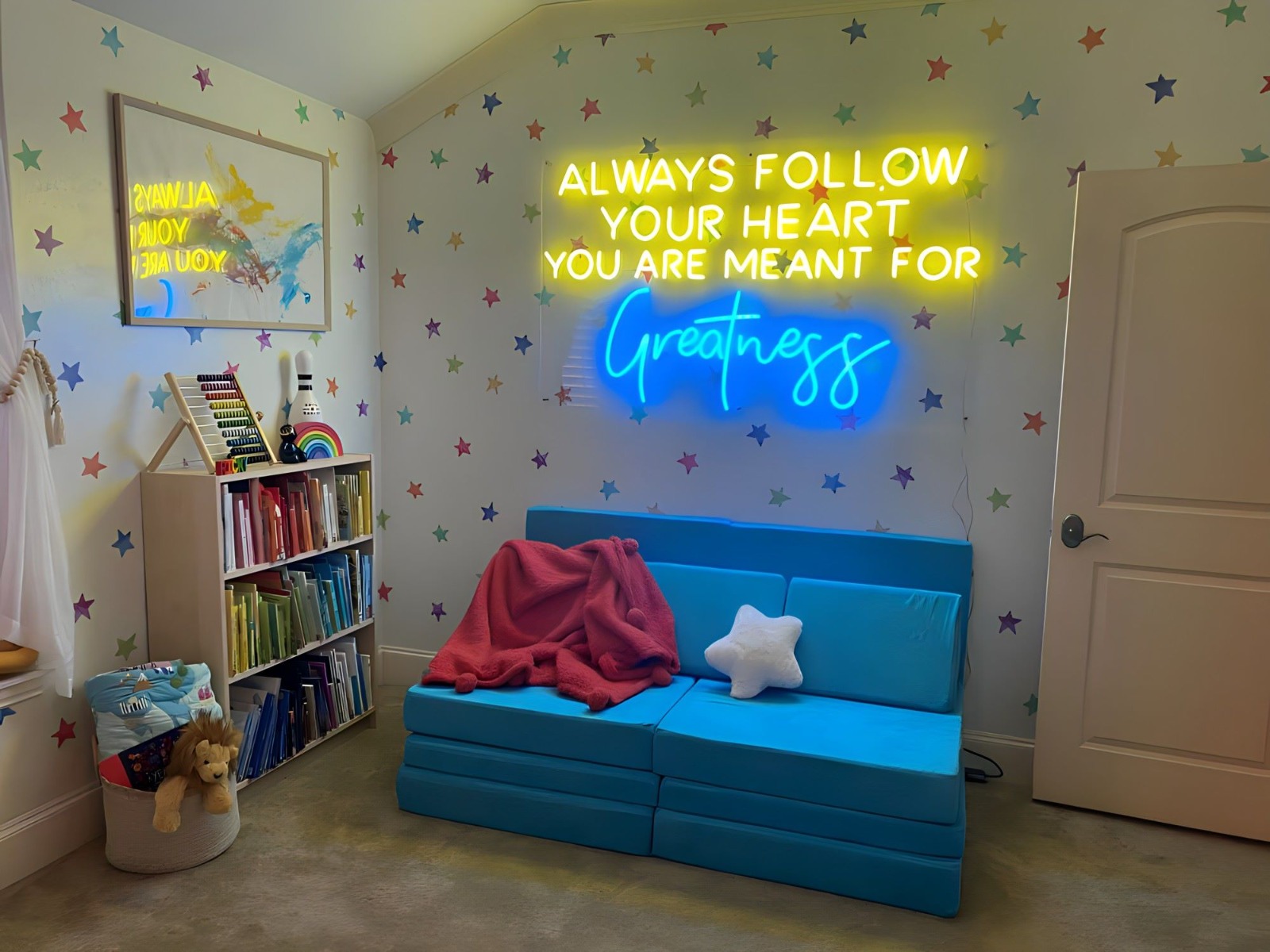 Large yellow & blue Custom Neon® quote sign in a kids room on matching wall paper