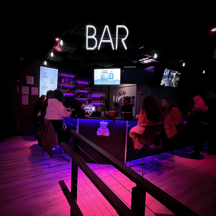 Custom Neon® white bar wayfinding sign @allsystemsgoma