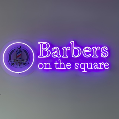 Custom Neon® purple LED neon and UV Print barbershop logo signage @barbers.onthesquare
