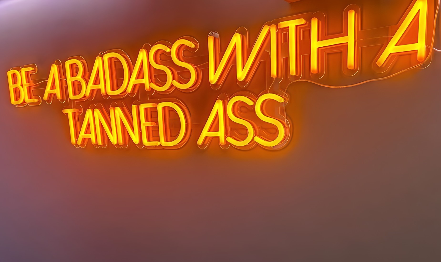 Be a badass with a tanned ass Custom Neon® orange quote sign @vlounge__