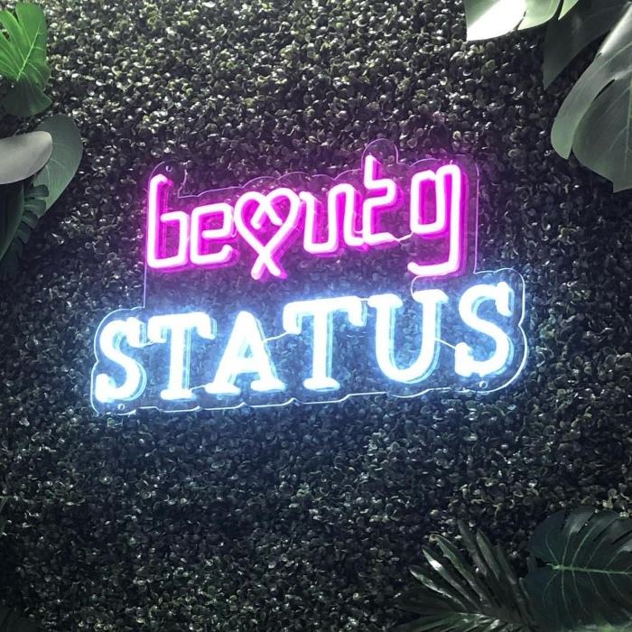 Custom Neon® Nail Salon logo sign on grass wall @beautystatus.uk