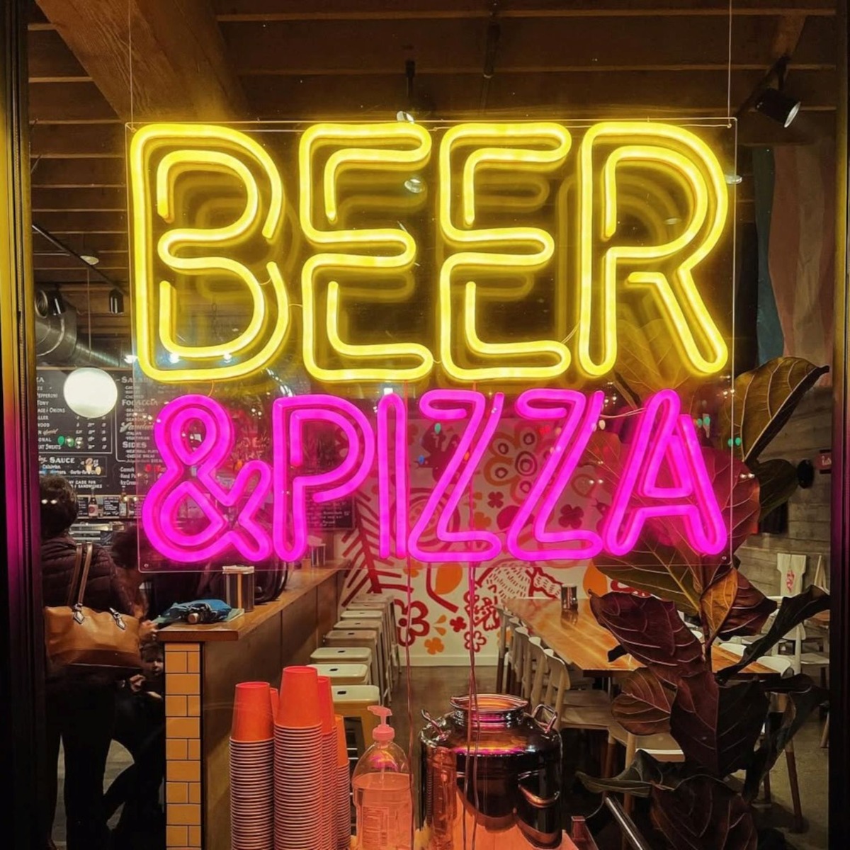 Northern Lights Lounge Custom Neon® color changing outdoor bar sign set to pink