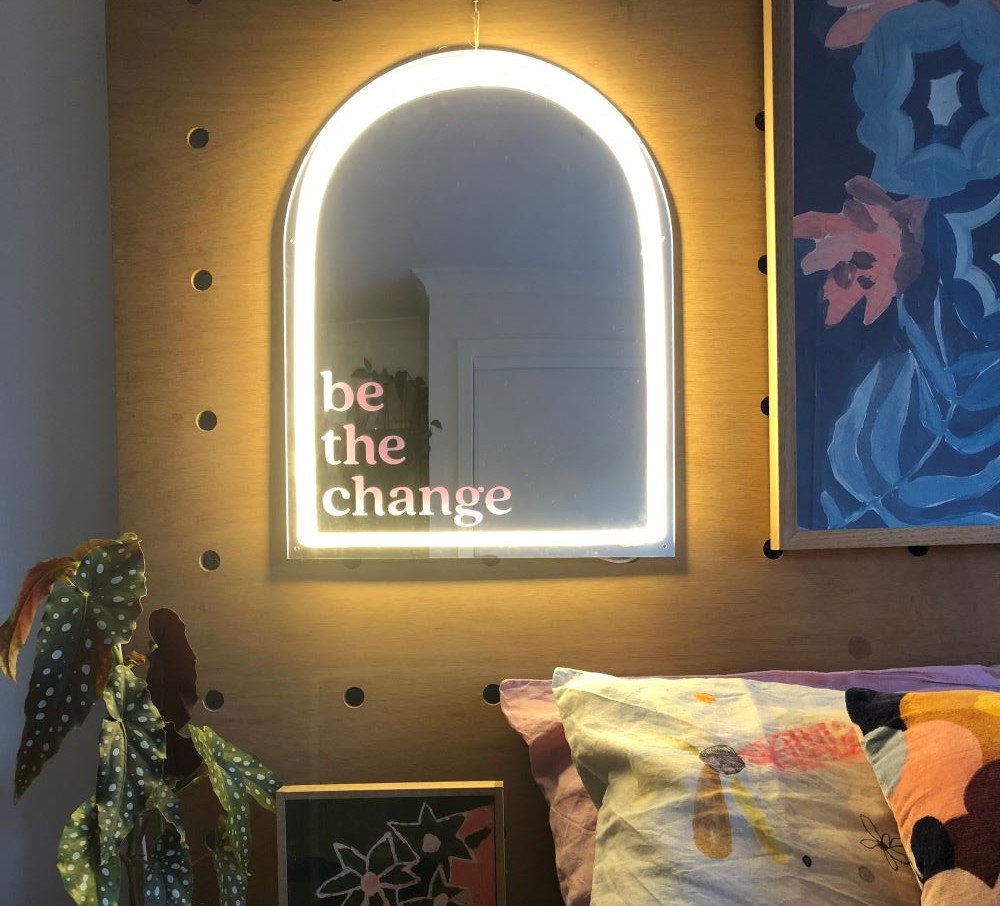 Custom Neon® Be the Change mirror framed in white LED flex in bedroom