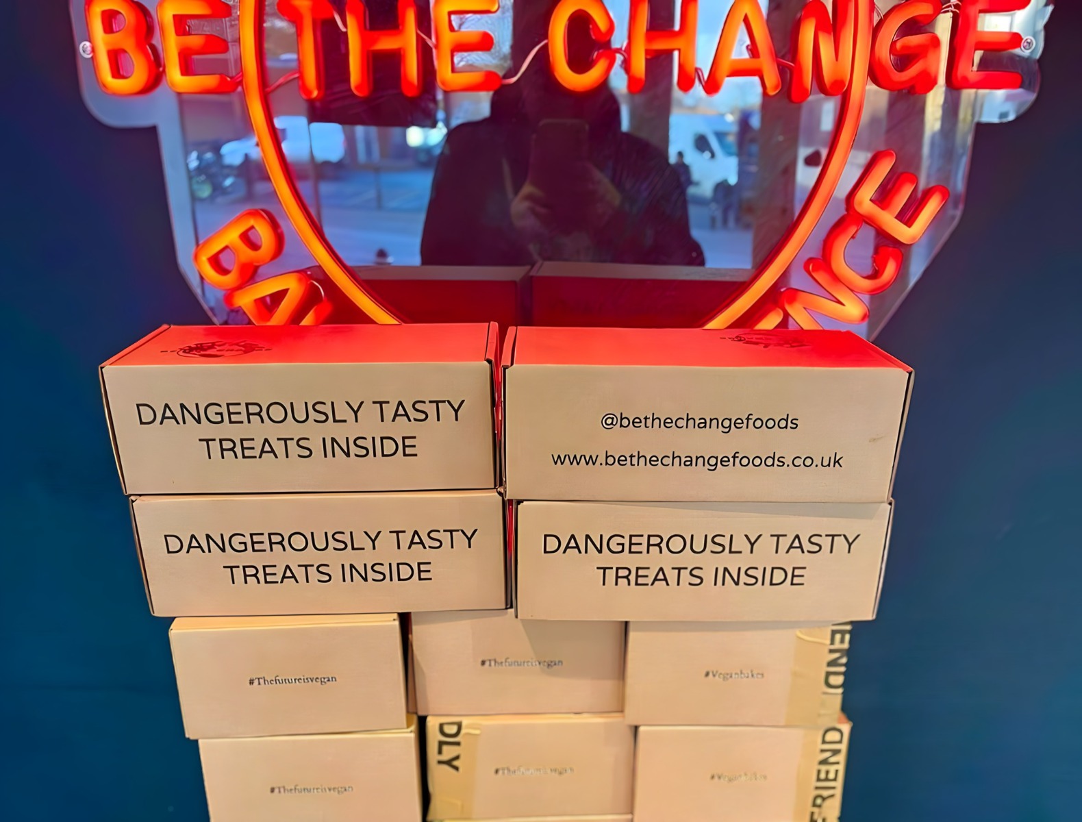 Custom Neon® red retailer slogan sign @btc.bakeadifference