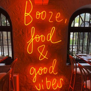 Orange wall sign @justinlaneest by Custom Neon®