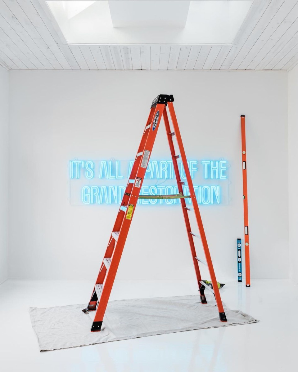 Blue Custom Neon® sign in living space designed by @bpatrickflynn
