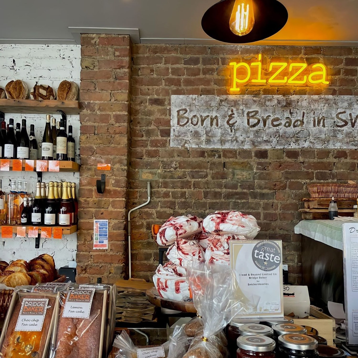 Bakery signage including an orange Custom Neon® sign @bridge_baker