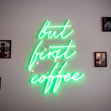 But First Coffee green Custom Neon® installed on a brick feature wall @pimlottandstrand