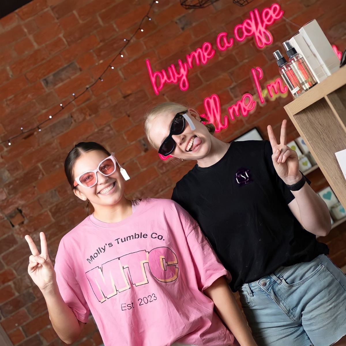 Buy me a coffee and tell me I'm pretty Custom Neon&reg; selfie backdrop sign in pink on red brick wall @csc_dubbo