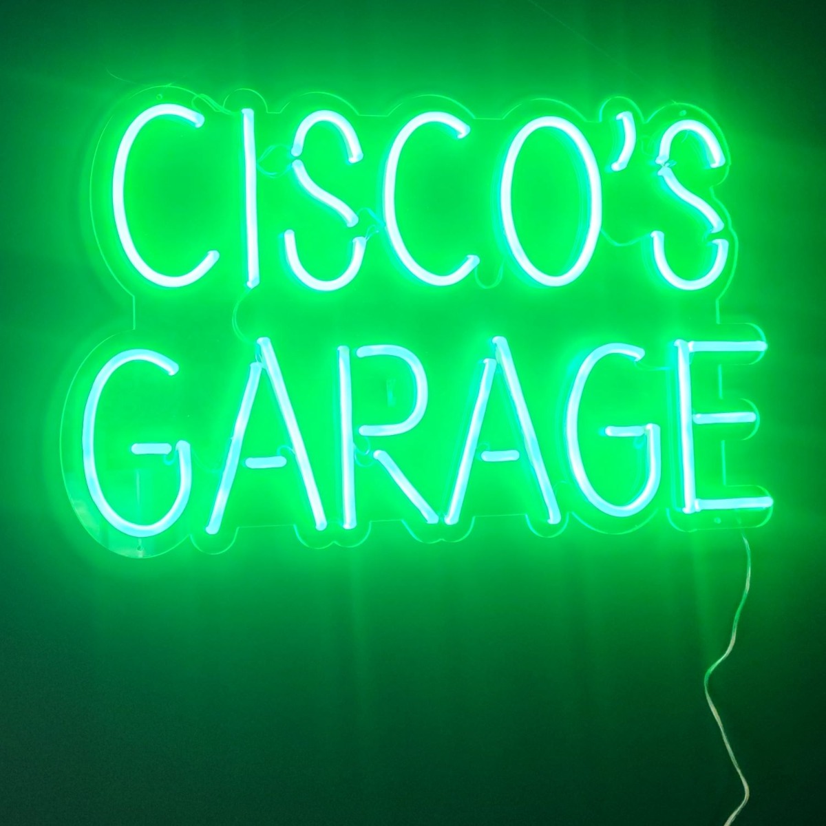 Custom Neon® green garage name sign