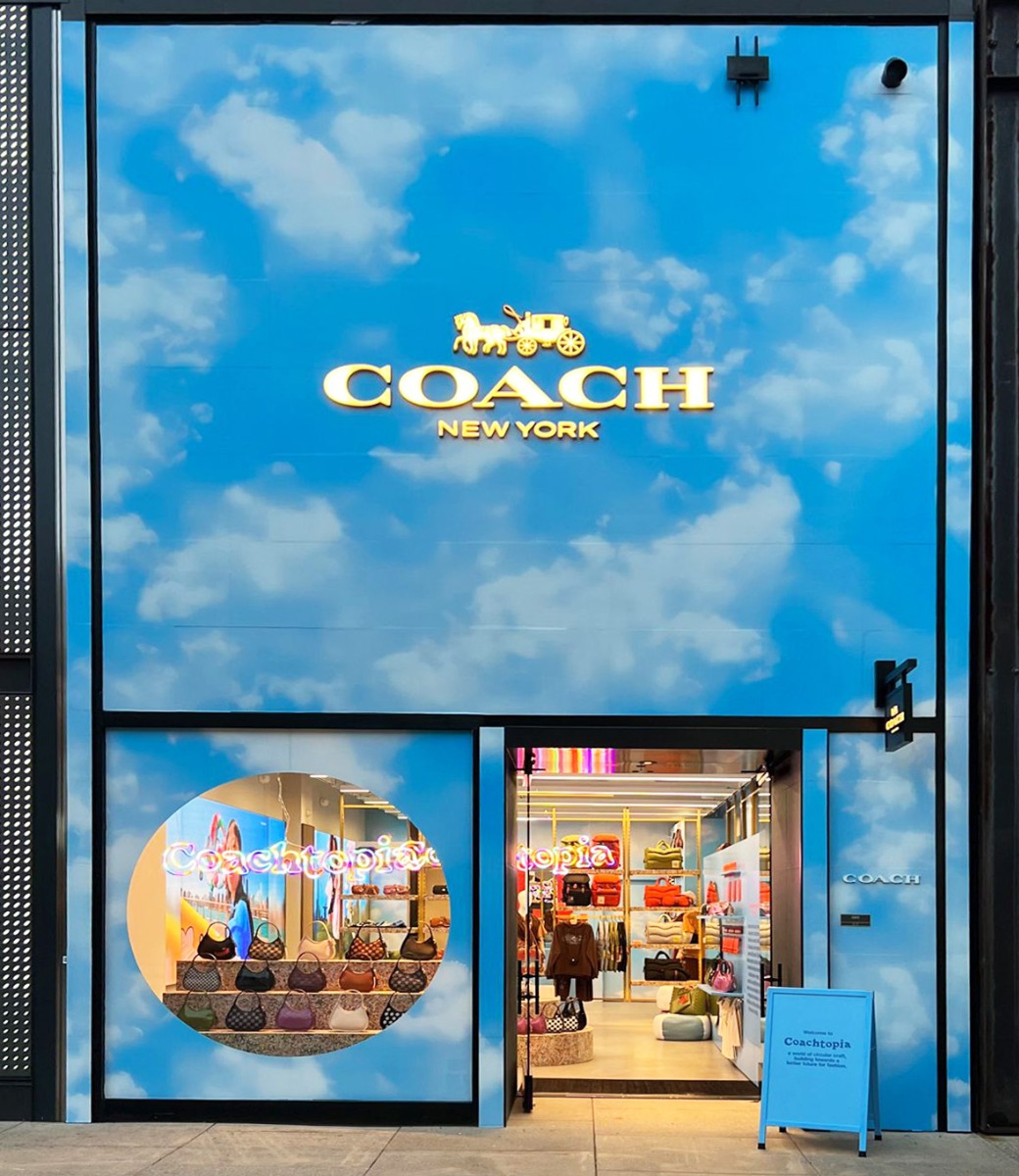 Coachtopia sustainable Custom Neon&reg; retail sign in the window of the New York @coach store