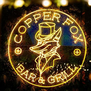 Copper Fox Bar and Grill circular logo in yellow LED neon flex