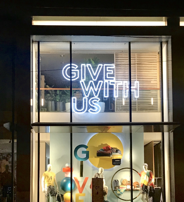 Custom Neon&reg; Christmas sale sign for clothing retailer