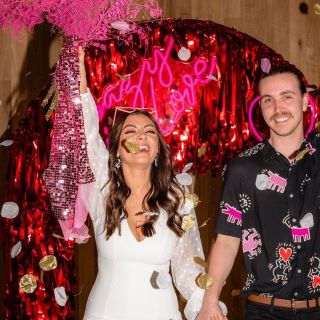 Custom Neon® Crazy in Love sign on streamer arch @styleourparty @thewarehouse @nicstephensphotography