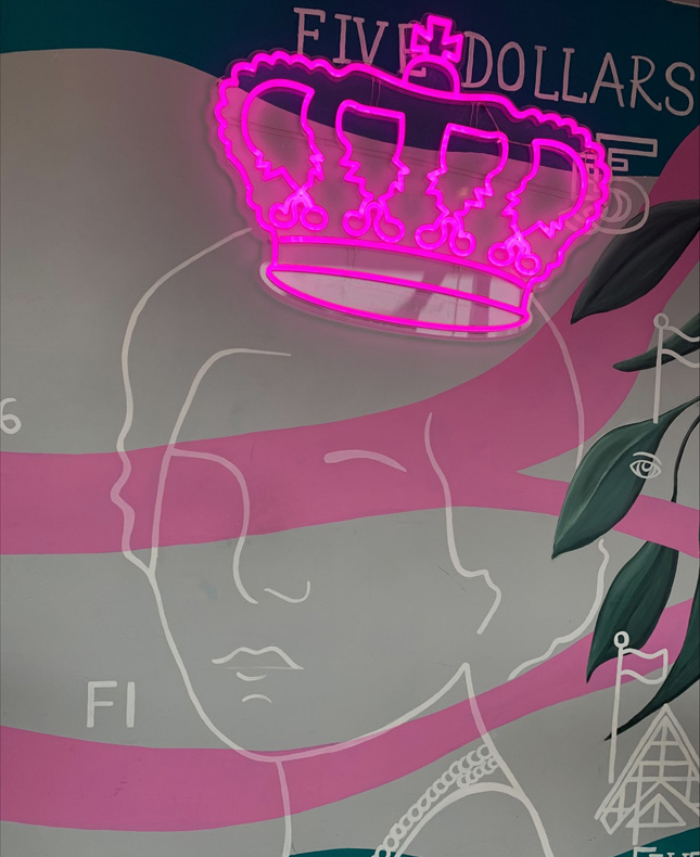 Custom Neon® pink crown installed on mural @vicparkhotel