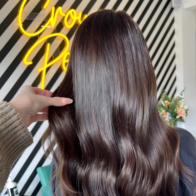 Yellow Custom Neon® hair salon name sign on white and black wall @crownperfect.uk