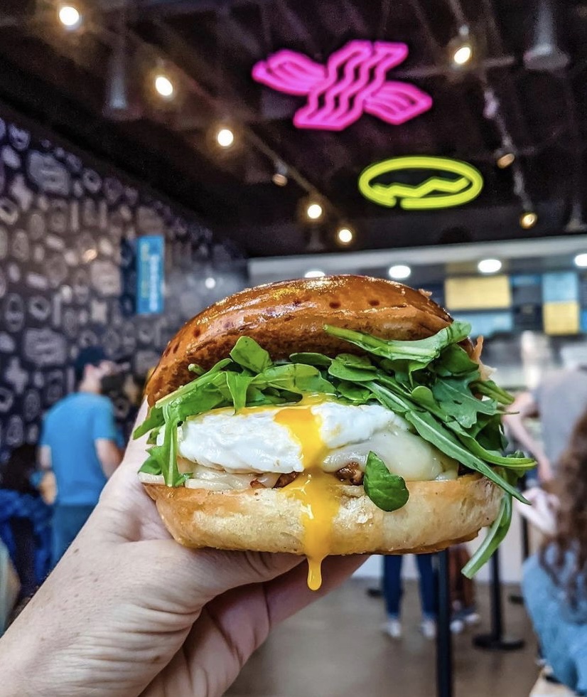 Custom Neon eggs & bacon attached to the ceiling @crackedeggery